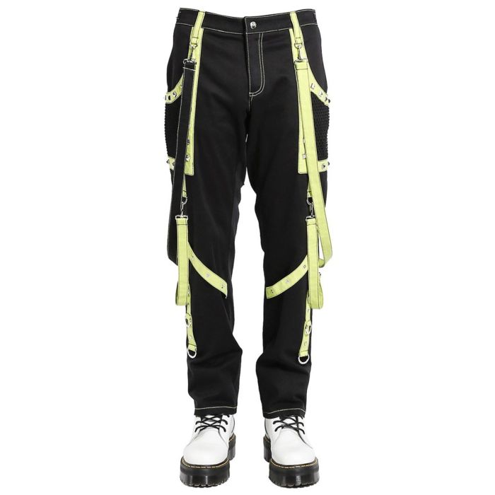 Nuvoun men's black and neon yellow gothic punk bondage pants featuring hanging straps, metal studs, and contrast stitching on a white background.